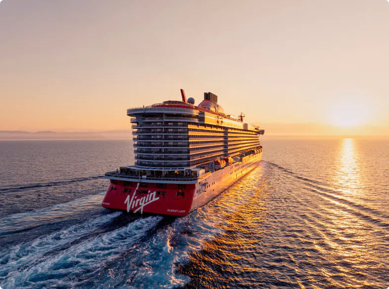 Virgin Voyages Scarlet Lady sailing away for another swinger cruise.