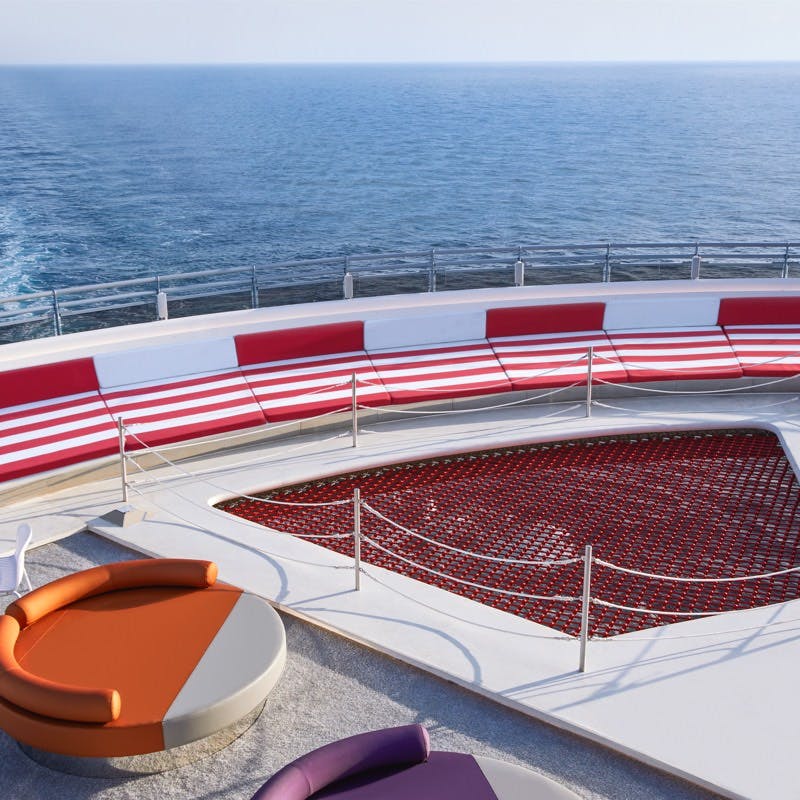 Athletic Club exterior, red net and orange chair at back of the ship